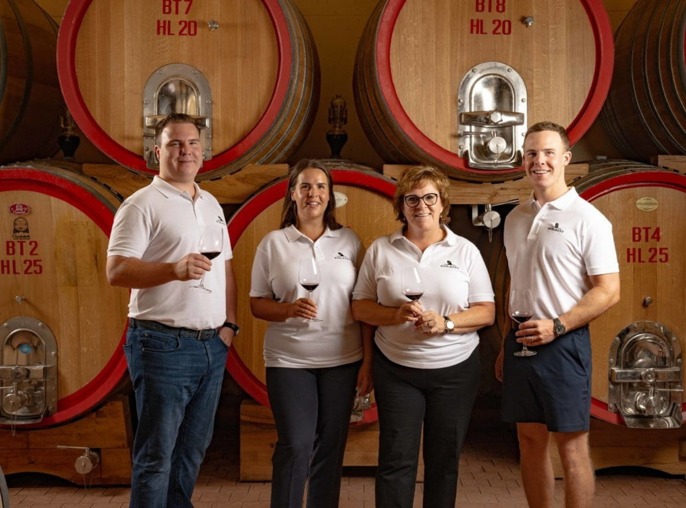 Tolaini family in winery
